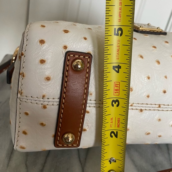 Dooney & Bourke White Ostrich Leather purse.
Brand new condition only used once. - Picture 11 of 11
